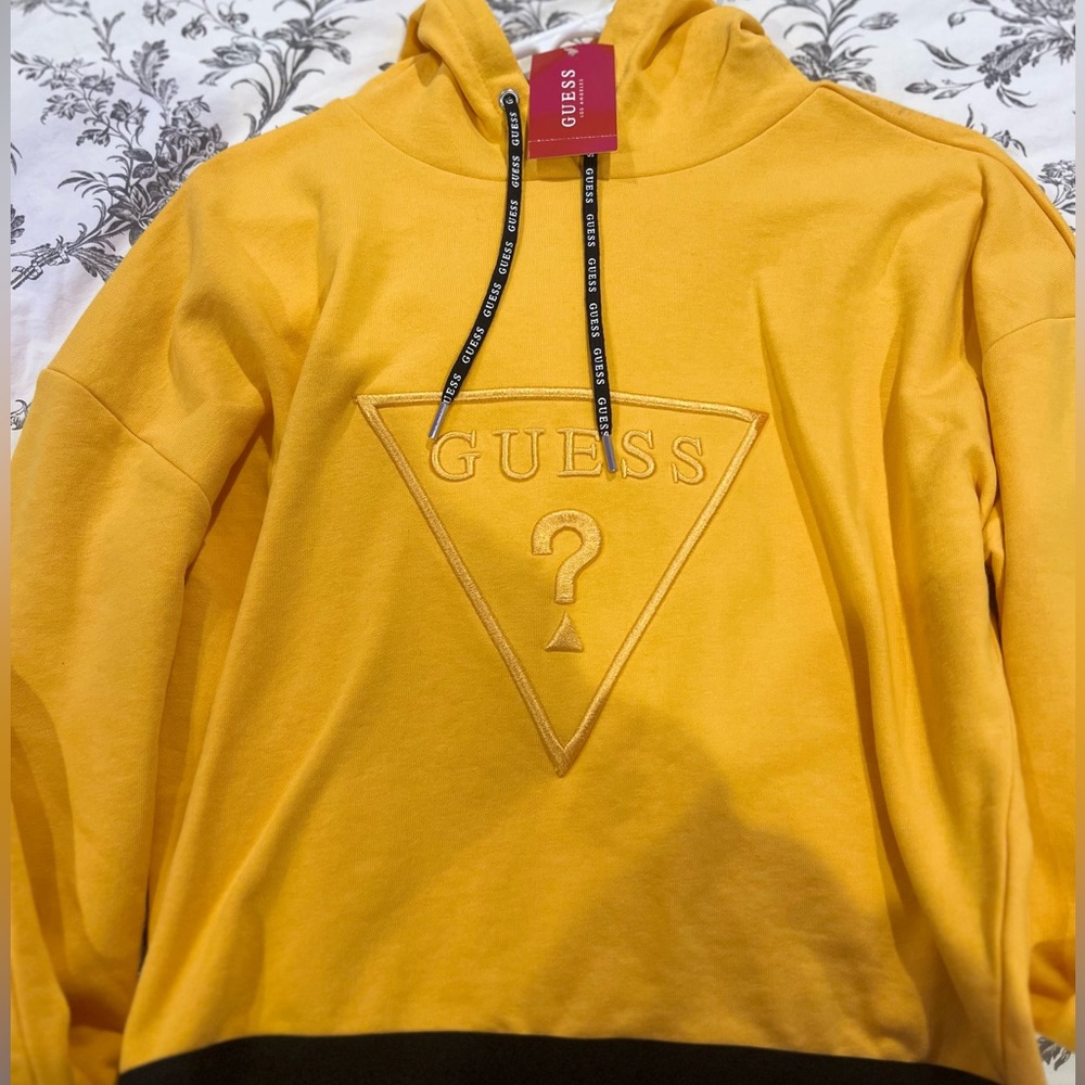 this is a Guess cropped hoodie that is brand new!!